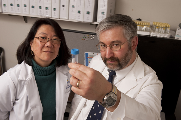 Russell Margolis with Nadine Yoritomo, a research nurse who performs most of the biopsies and clinical interviews for his schizophrenia studies. Photo: Will Kirk/Homewoodphoto.jhu.edu